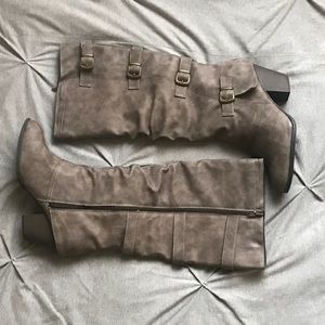 Heeled boots with faux buckles
